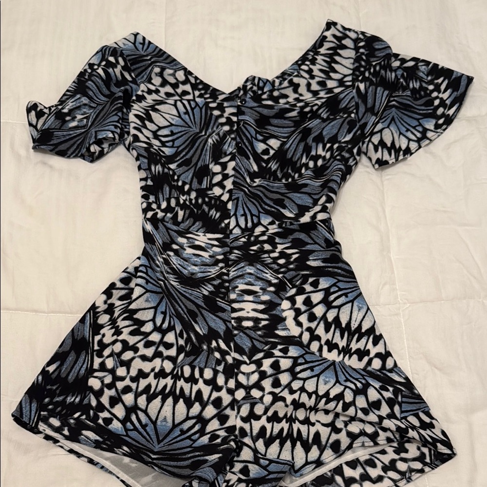 Charming Charlie Black and Blue Patterned Jumpsuit